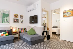 Comfort Apartment, 1 Bedroom, Ground Floor | Living room | Flat-screen TV
