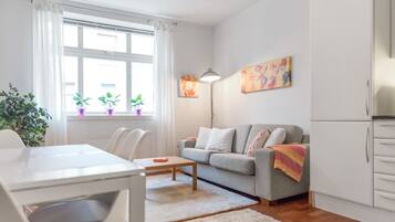 City Apartment, 2 Bedrooms | Living room | Flat-screen TV