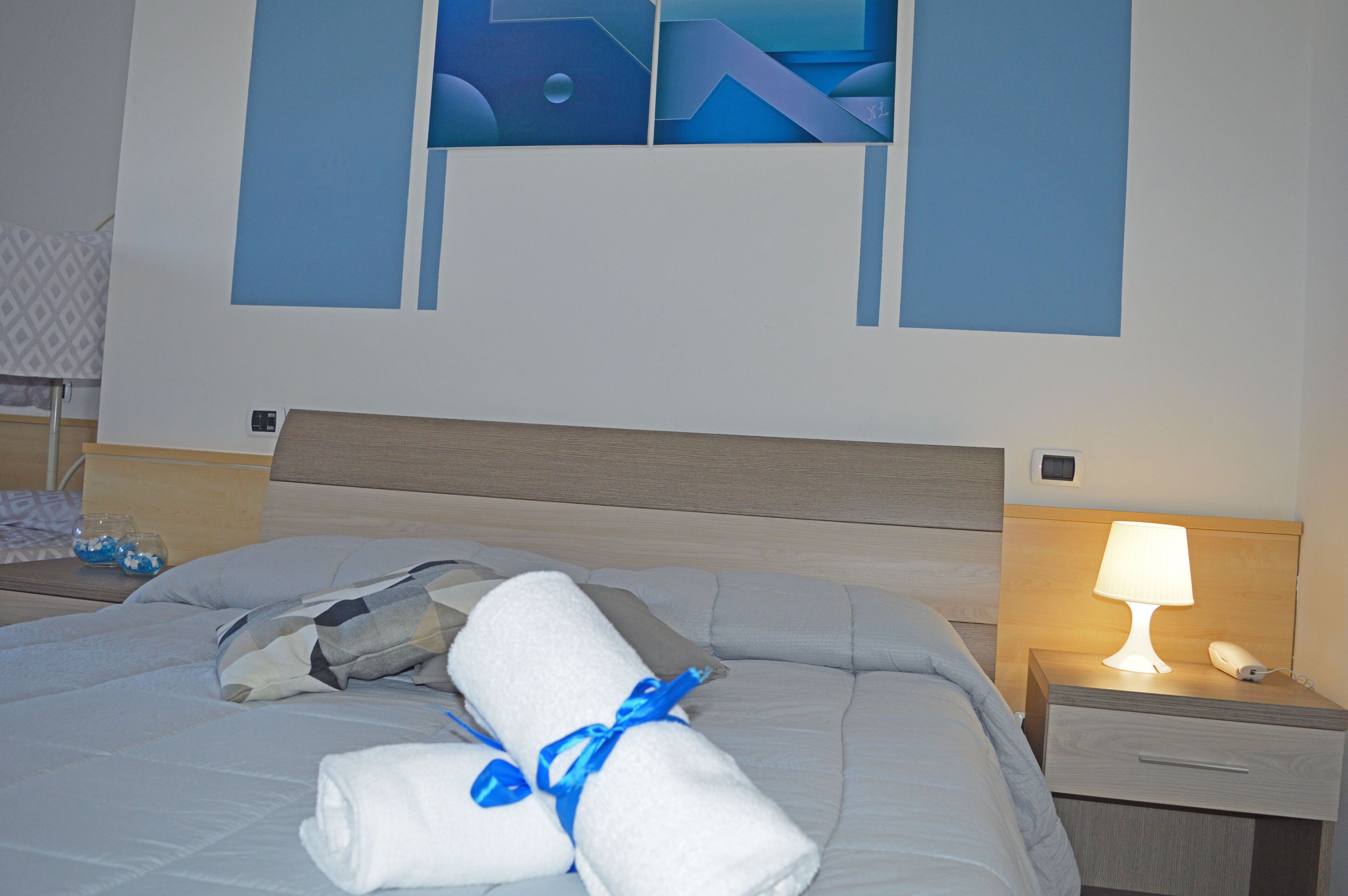 standard quadruple room, multiple beds | minibar, in-room safe, desk, free wifi