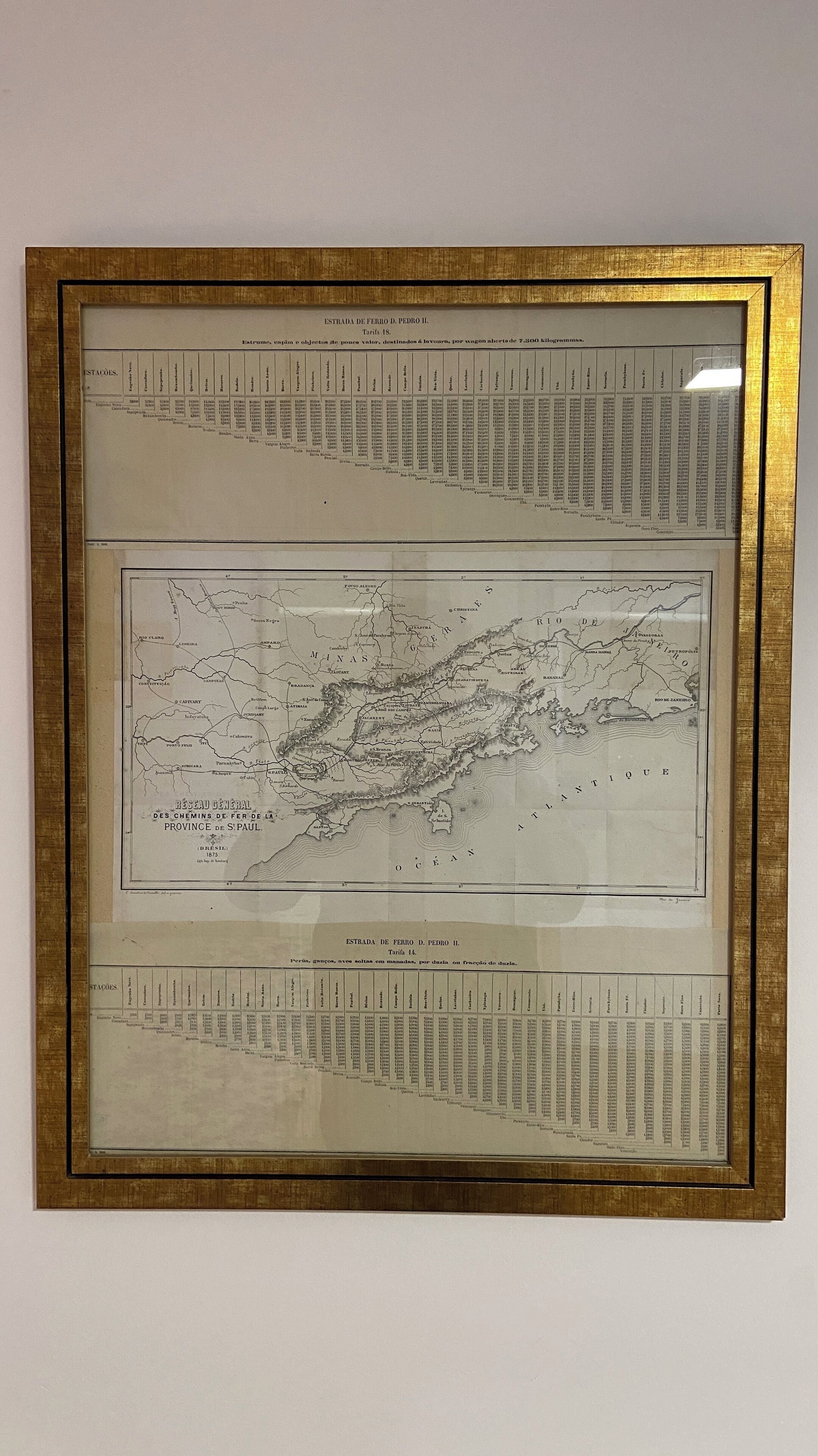 A framed historical map with detailed geographical and administrative information.
