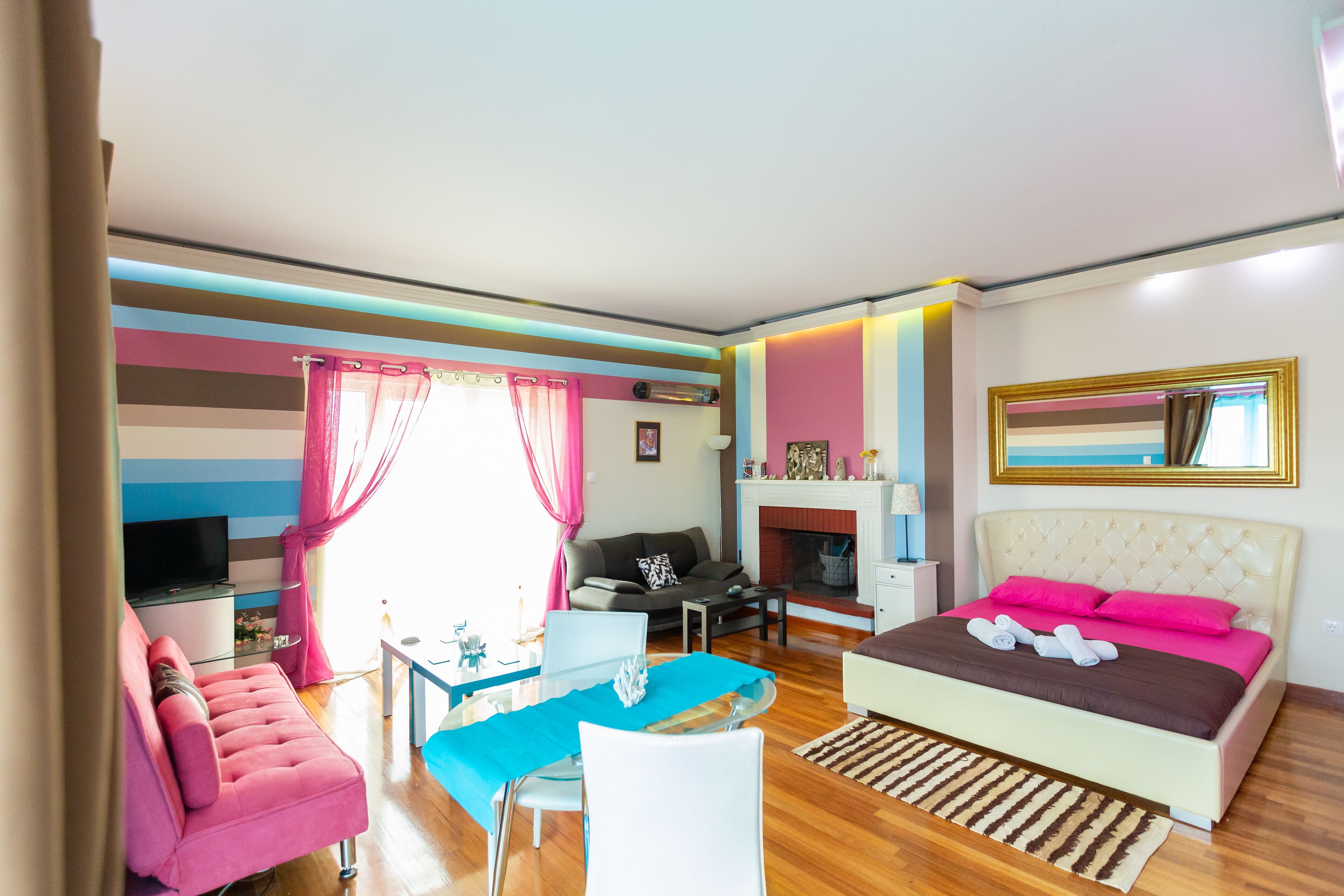 apartment, sea view (triple studio) | living area | plasma tv