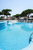Seasonal outdoor pool, open 8:00 AM to 8 PM, sun loungers