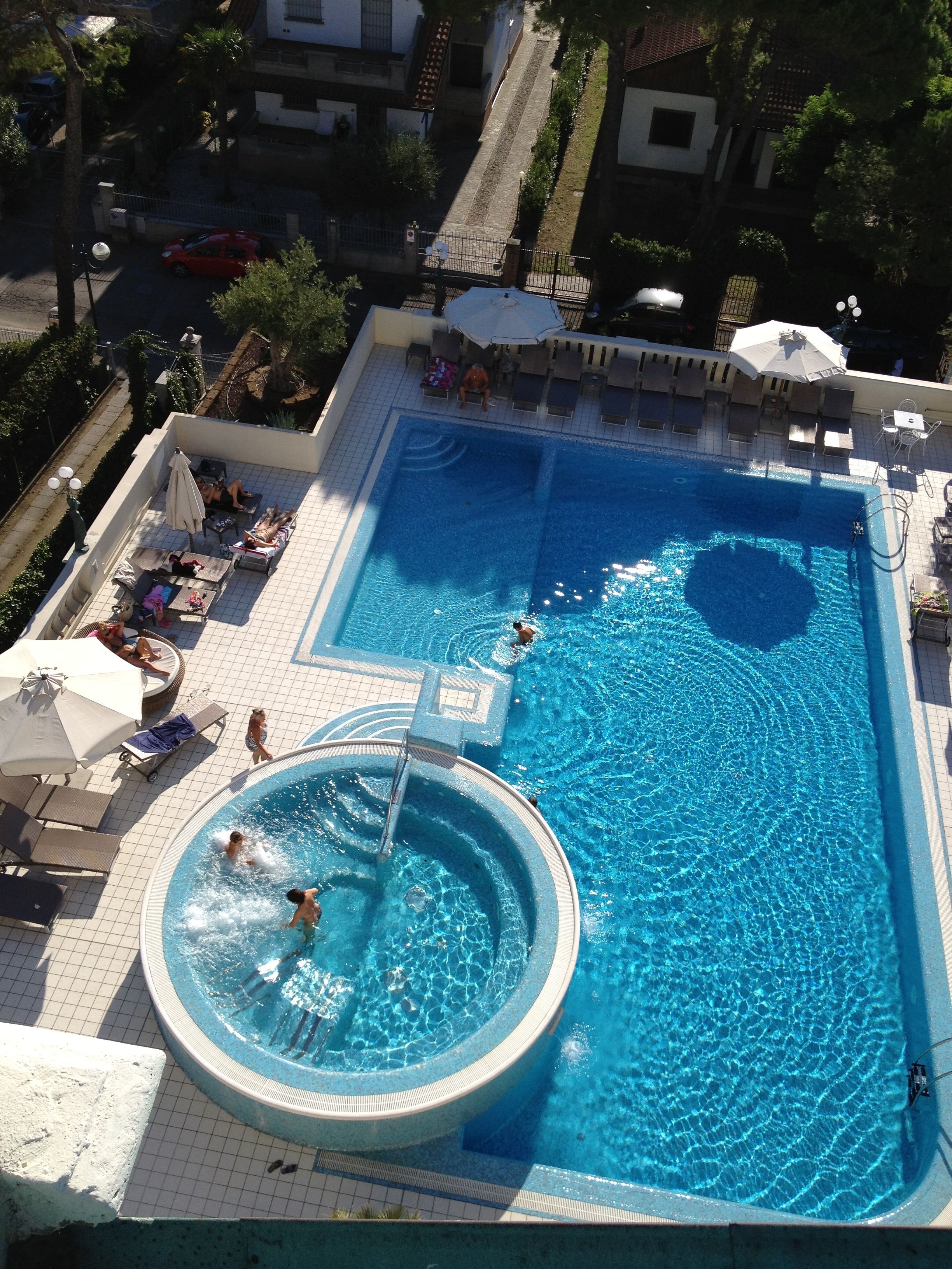 seasonal outdoor pool, open 8:00 am to 8 pm, pool loungers