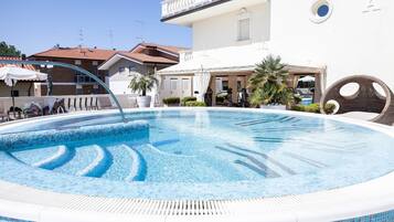 Seasonal outdoor pool, open 8:00 AM to 8 PM, sun loungers