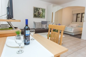 Studio, Balcony | In-room dining
