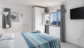Apartment, 1 Bedroom | 1 bedroom, iron/ironing board, cribs/infant beds, free WiFi - Sunrise Suite (Massa Lubrense)