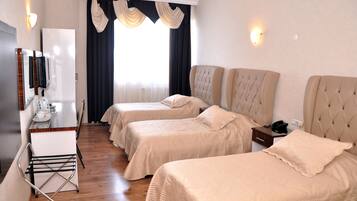 Triple Room | Premium bedding, minibar, in-room safe, desk