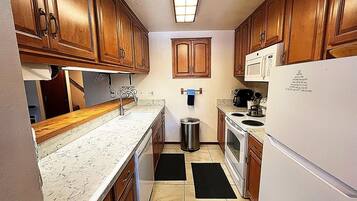 Condo, 2 Bedrooms | Private kitchen | Fridge, microwave, dishwasher, coffee/tea maker