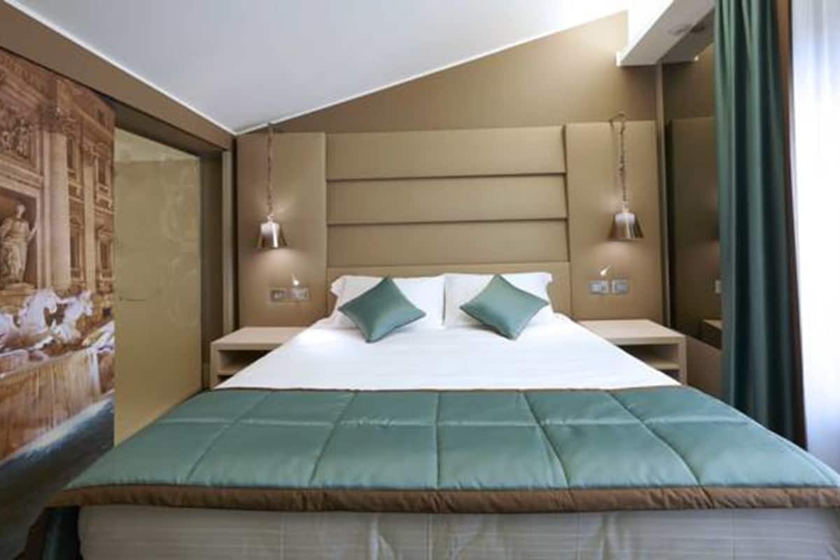 Deluxe eenpersoonskamer | 1 slaapkamer, luxe beddengoed, donzen dekbedden, een minibar