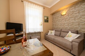  One - Bedroom Apartment with Park View | Living area