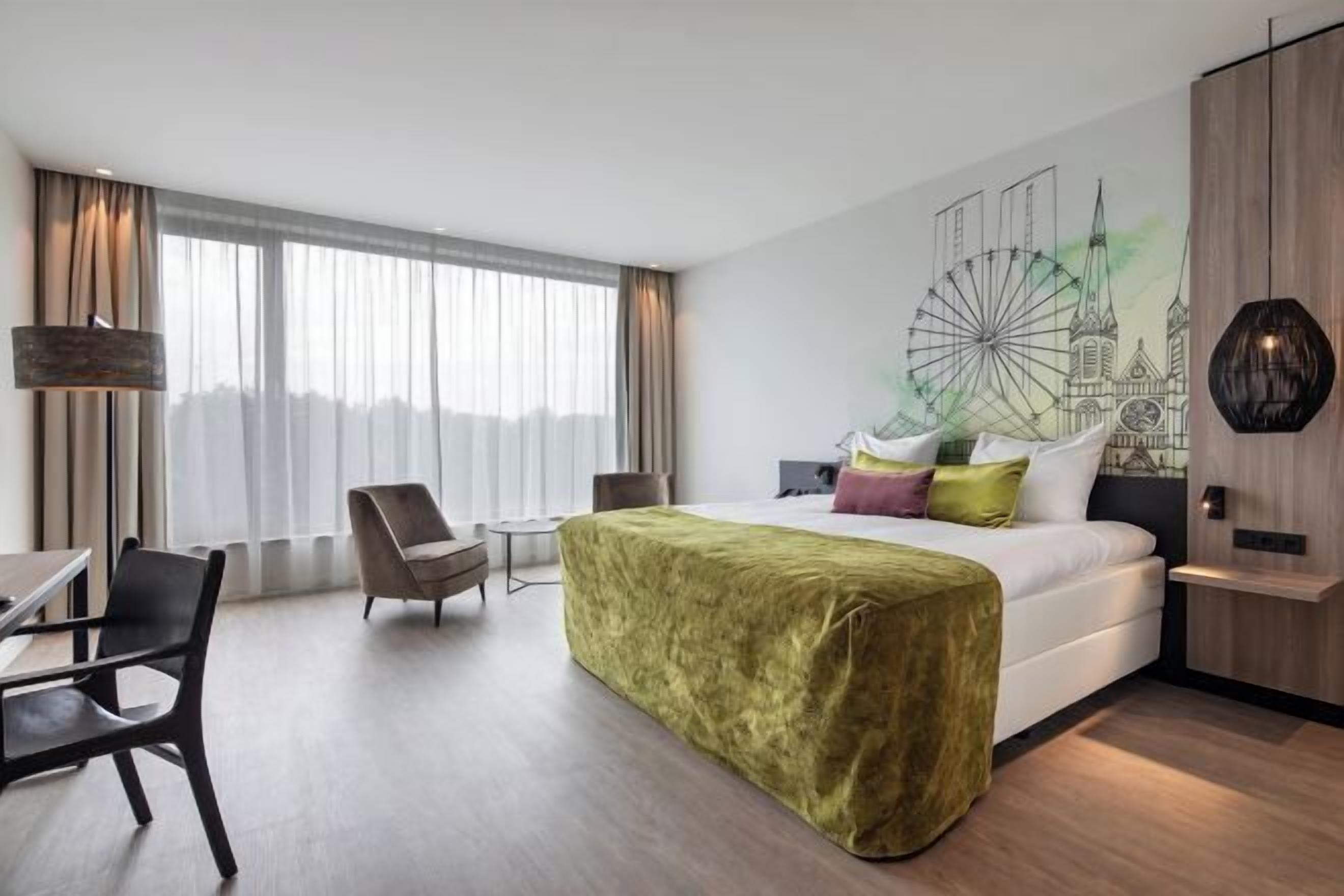 Hypoallergeen beddengoed, een minibar, een kluis op de kamer, een bureau