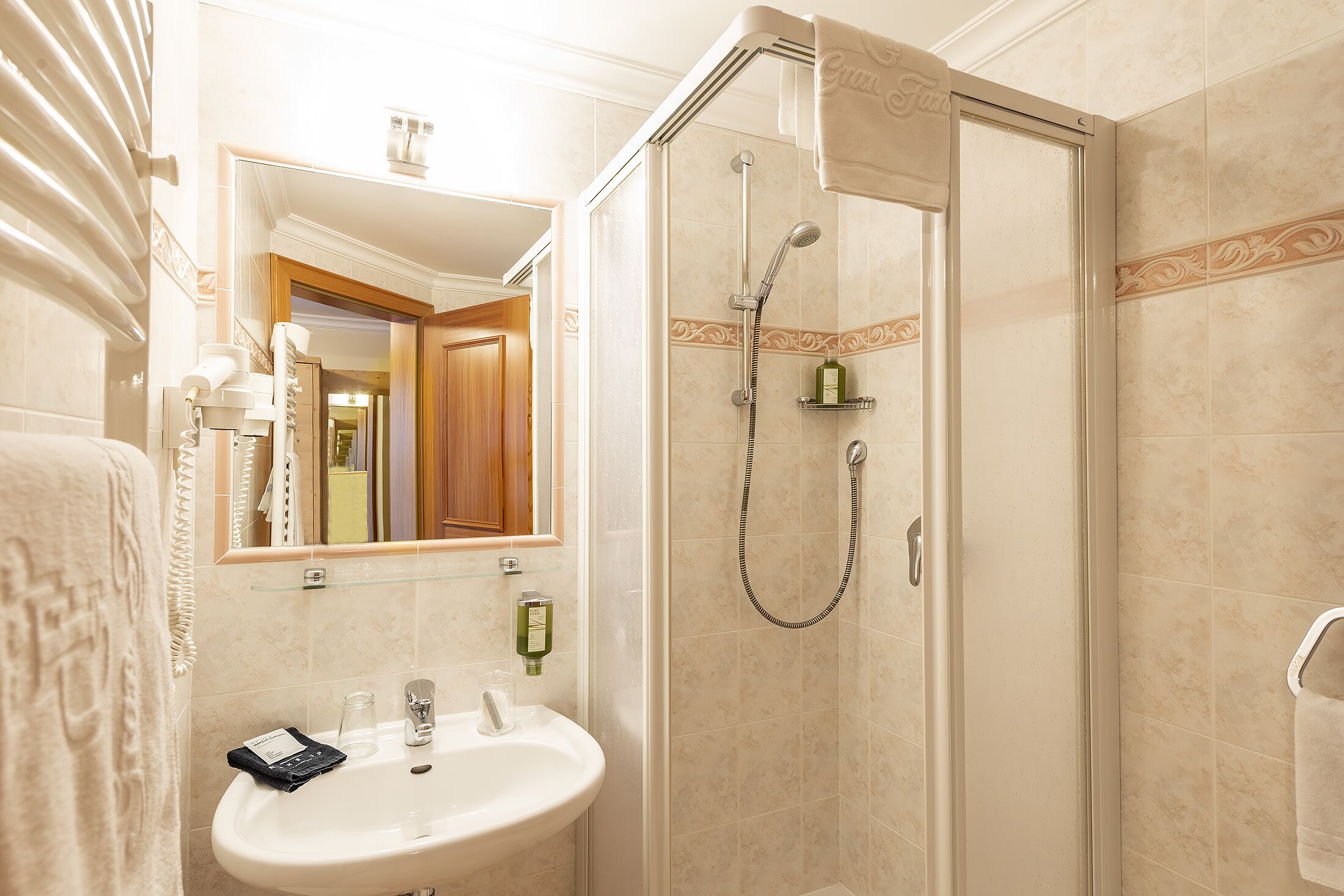 standard single room | bathroom | rainfall showerhead, free toiletries, hair dryer, bidet