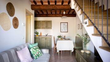 Apartment, 3 Bedrooms | Living area | Flat-screen TV, table tennis