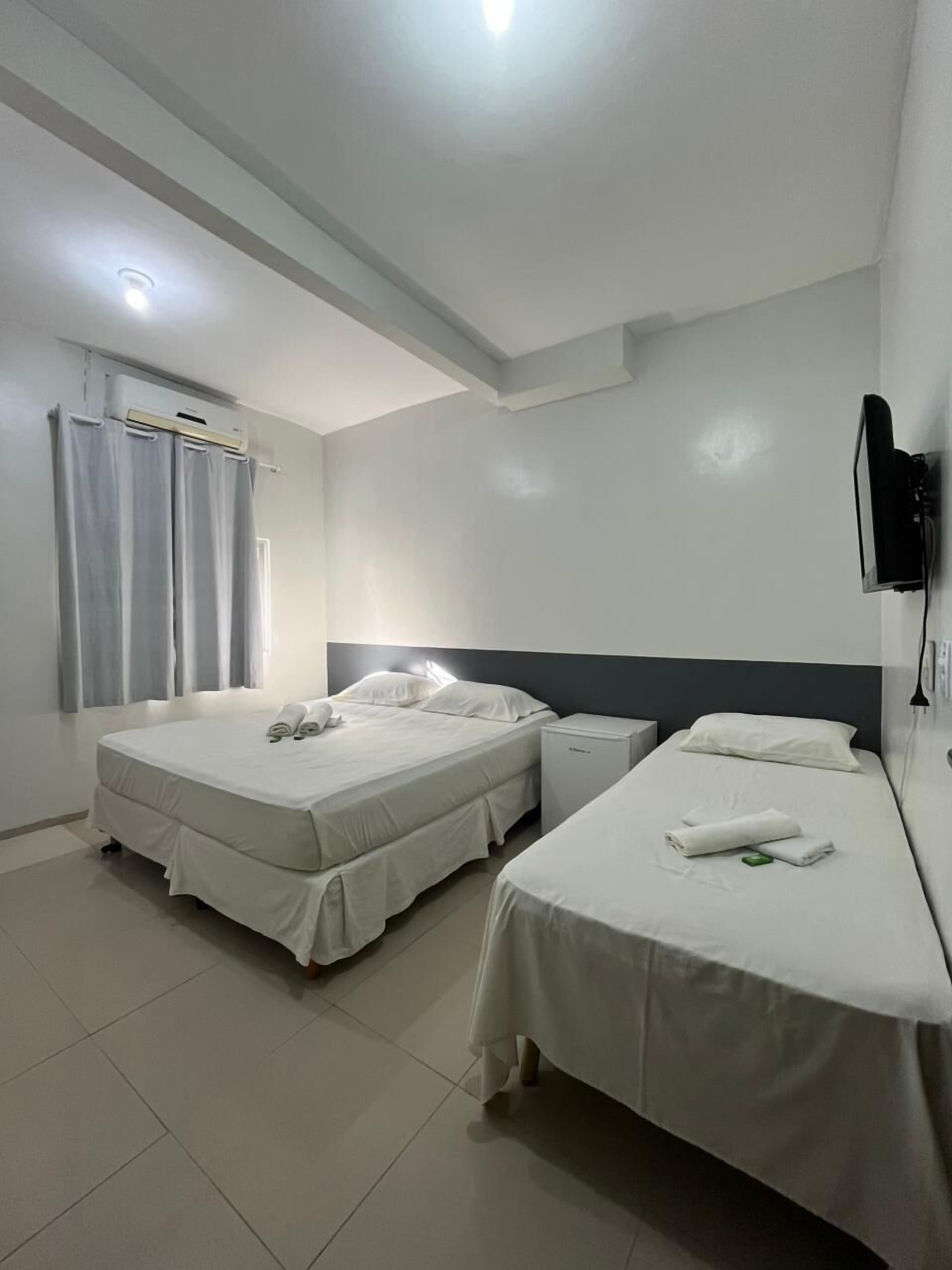 Comfort driepersoonskamer | Een minibar, gratis wifi