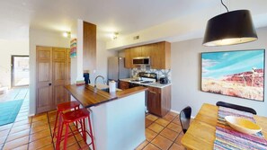 Coffee/tea maker, fridge, microwave, oven