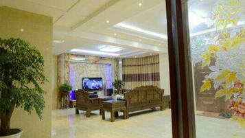 Deluxe-Villa | Wohnzimmer | Fernseher