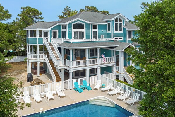 A heated pool, pool loungers