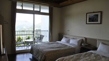 Family Room, Balcony | Blackout drapes, free WiFi, bed sheets