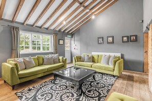 Smart TV, fireplace, video game console, table football