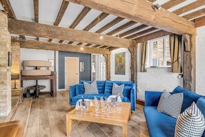 Smart TV, fireplace, video game console, table football