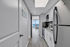 Signature Condo, 1 Bedroom, Balcony, Beach View | Private kitchen | Fridge, microwave, stovetop, coffee/tea maker - Boardwalk Resort by Hosteeva (Myrtle Beach)