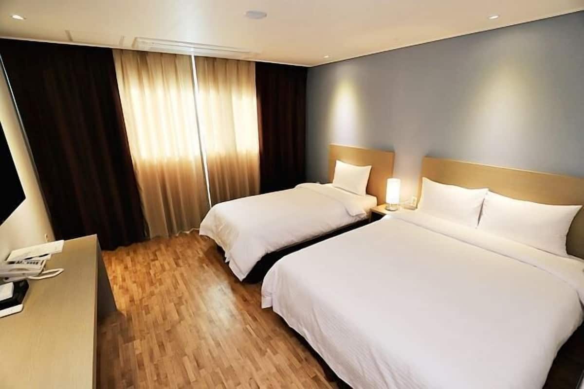 Premium bedding, blackout curtains, soundproofing, free WiFi