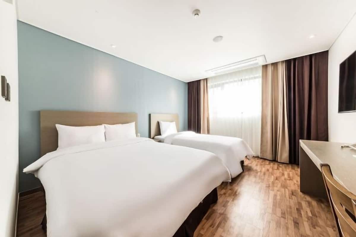 Premium bedding, blackout curtains, soundproofing, free WiFi