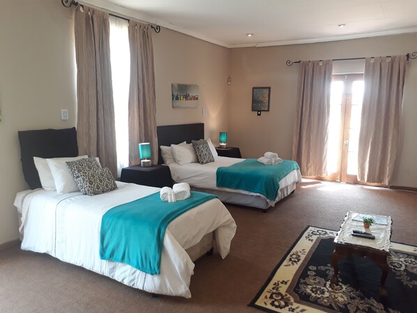 Family Room | 10 bedrooms, premium bedding, pillow-top beds, individually decorated - The Guest House (Lekwa)