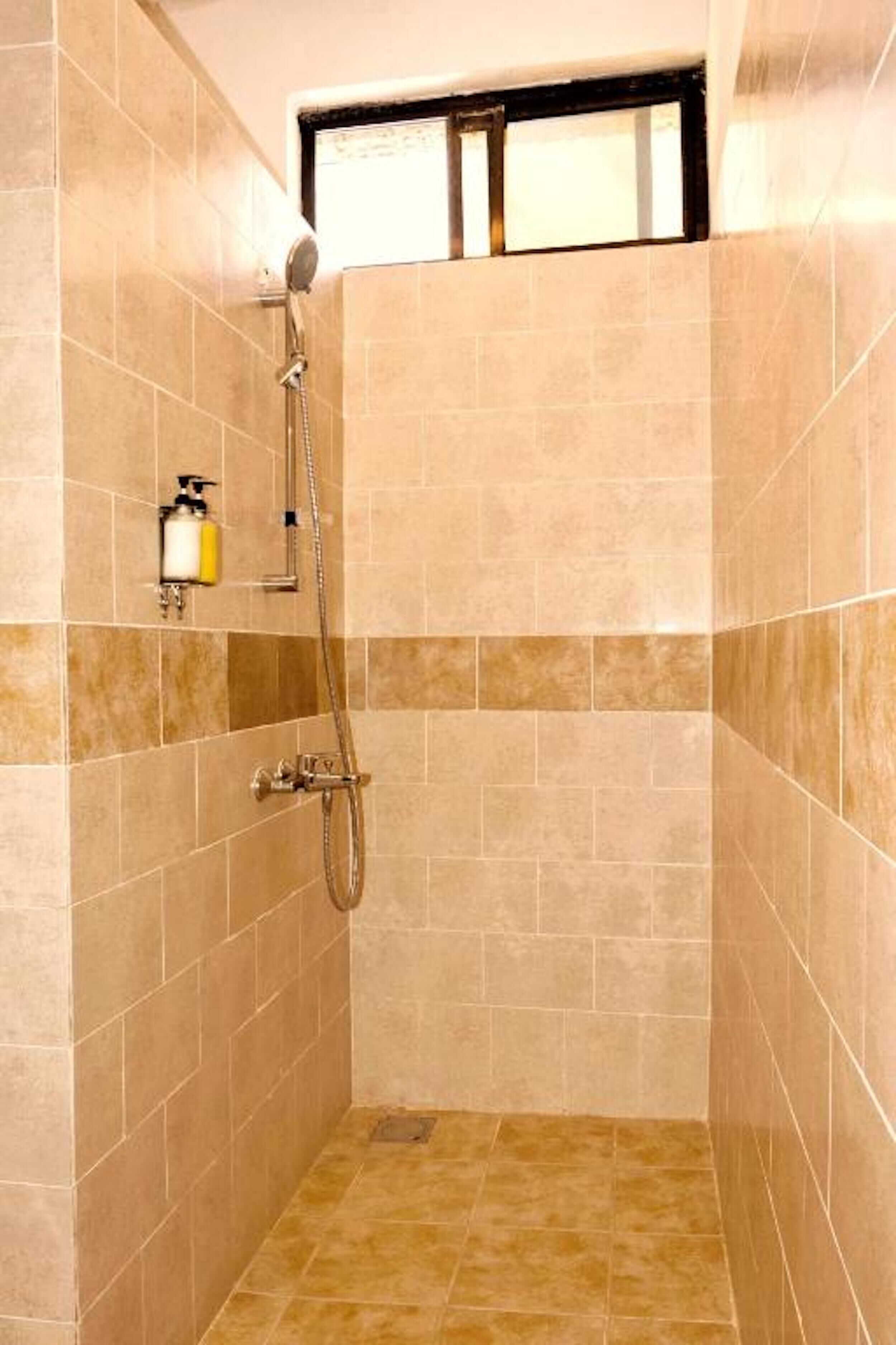 shower, rainfall showerhead, hair dryer, towels