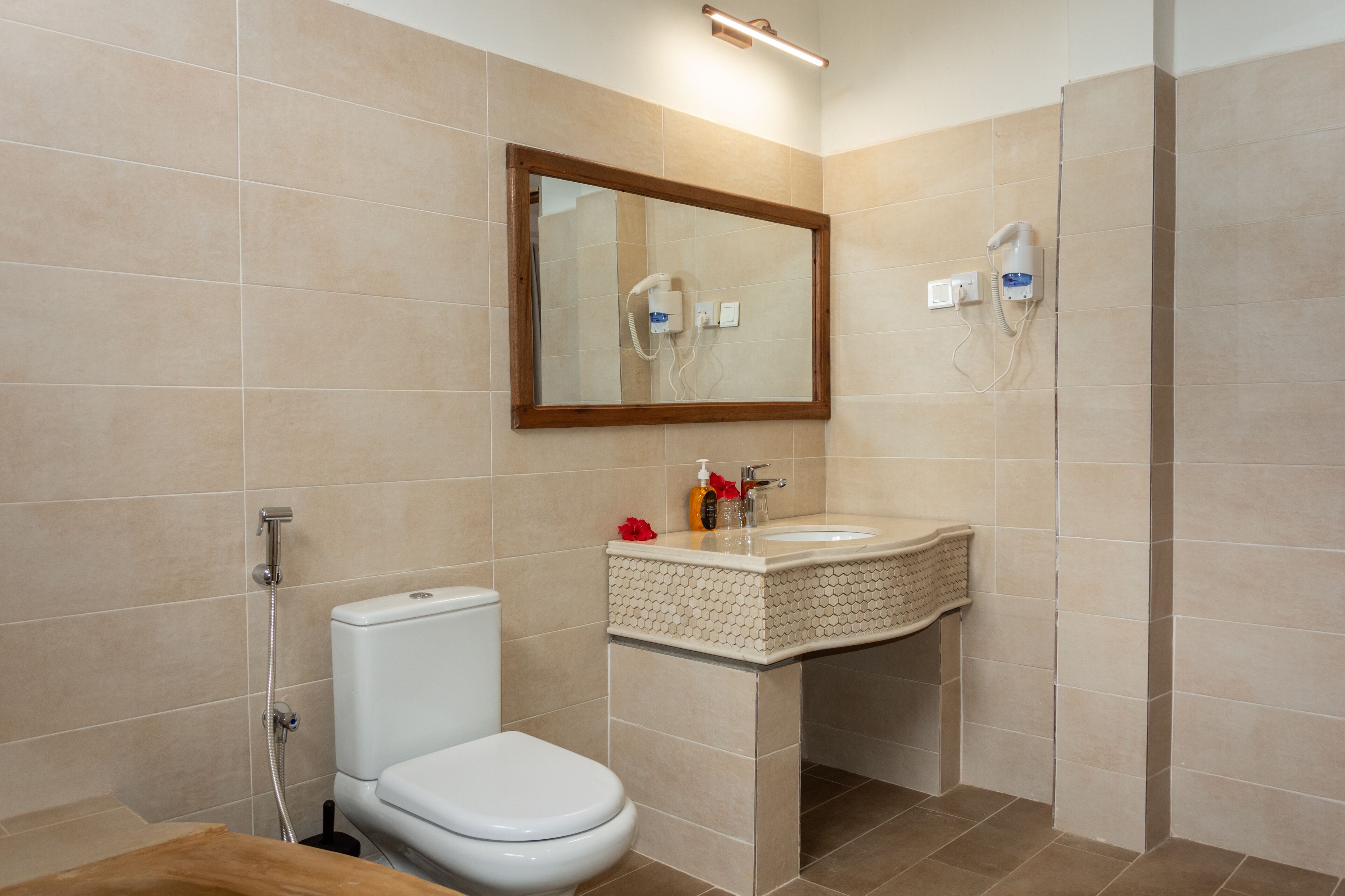 shower, rainfall showerhead, hair dryer, towels