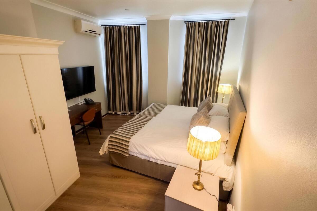 Luxury Double Room, 1 King Bed, Kitchenette | Premium bedding, in-room safe, desk, laptop workspace