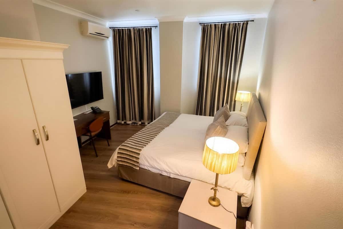 Luxury Double Room, 1 King Bed, Kitchenette | Premium bedding, in-room safe, desk, laptop workspace