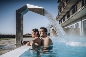 Seasonal outdoor pool, open 7:00 AM to 10:00 PM, pool umbrellas