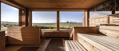 Badstue, dampbad, kroppsbehandlinger og massasje med varme steiner