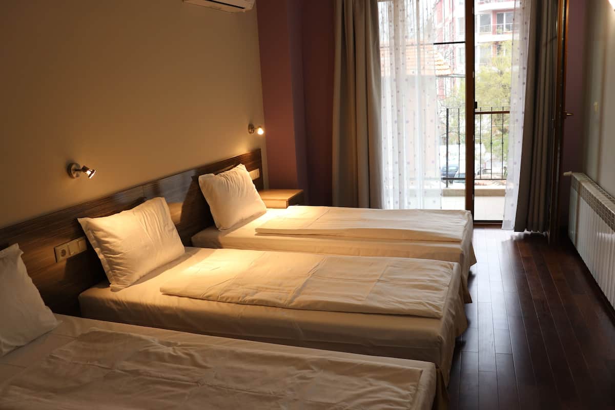 comfort triple room, non smoking, city view | 1 bedroom, premium bedding, desk, laptop workspace