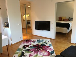 Exclusive Apartment, 1 Bedroom, City View, Garden Area | Living area | 42-inch flat-screen TV with cable channels, TV, DVD player - Top Apartments Helsinki - Tilkka (Helsinki)