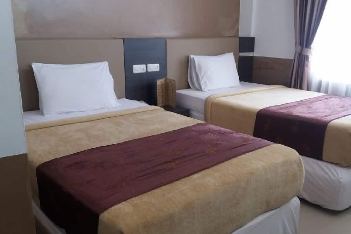 Chambre Supérieure avec lits jumeaux