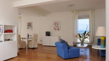 Appartamento Executive, 2 camere da letto | Area soggiorno | TV a schermo piatto