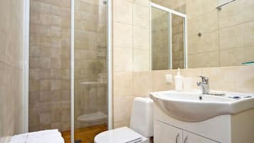 Shower, free toiletries, hair dryer, slippers
