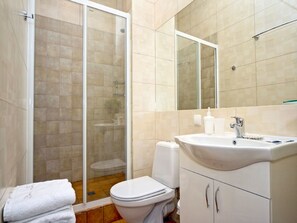 Shower, free toiletries, hair dryer, slippers