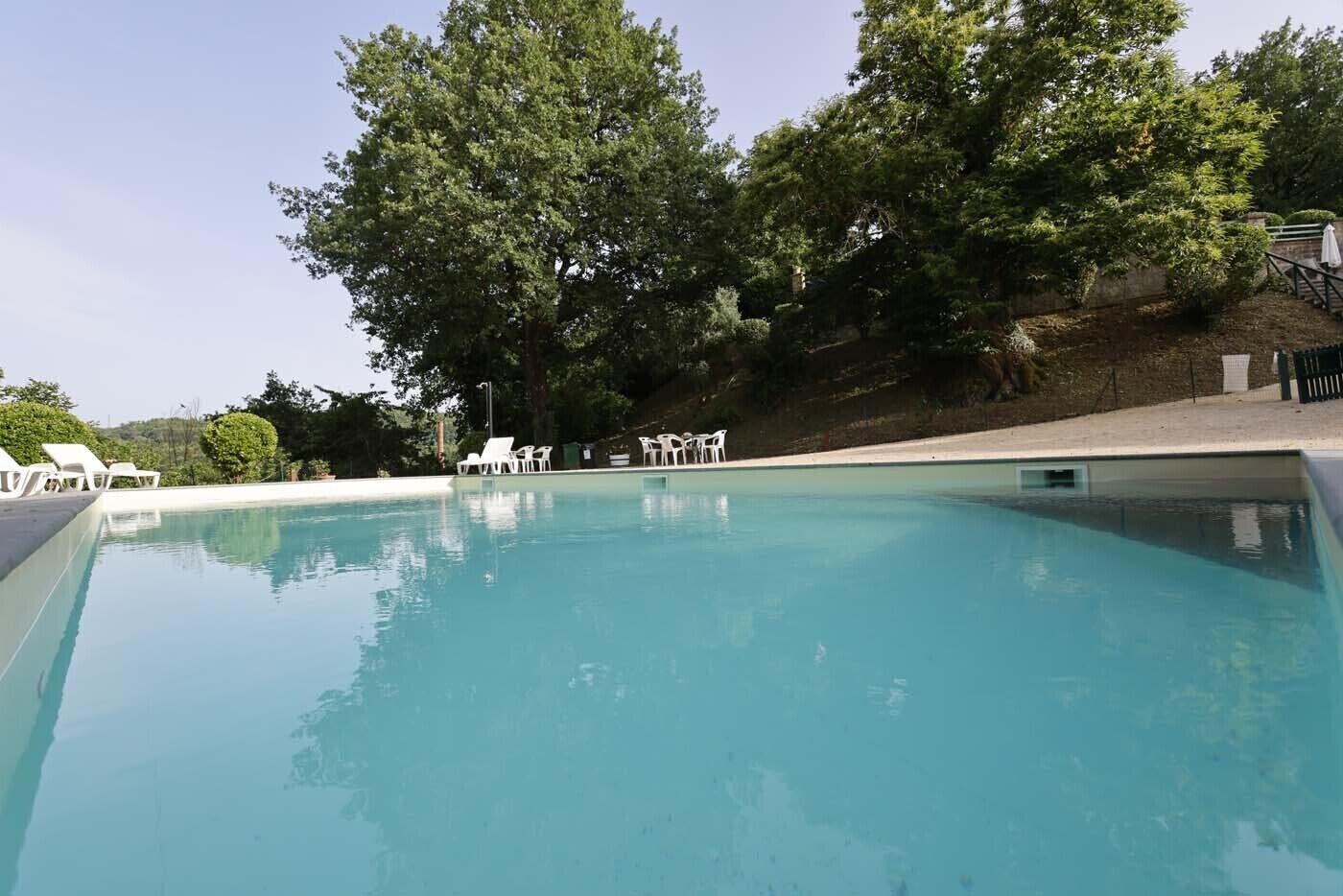 Seasonal outdoor pool, a rooftop pool, sun loungers