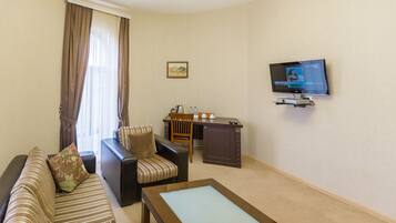 Family Suite | Living room | TV