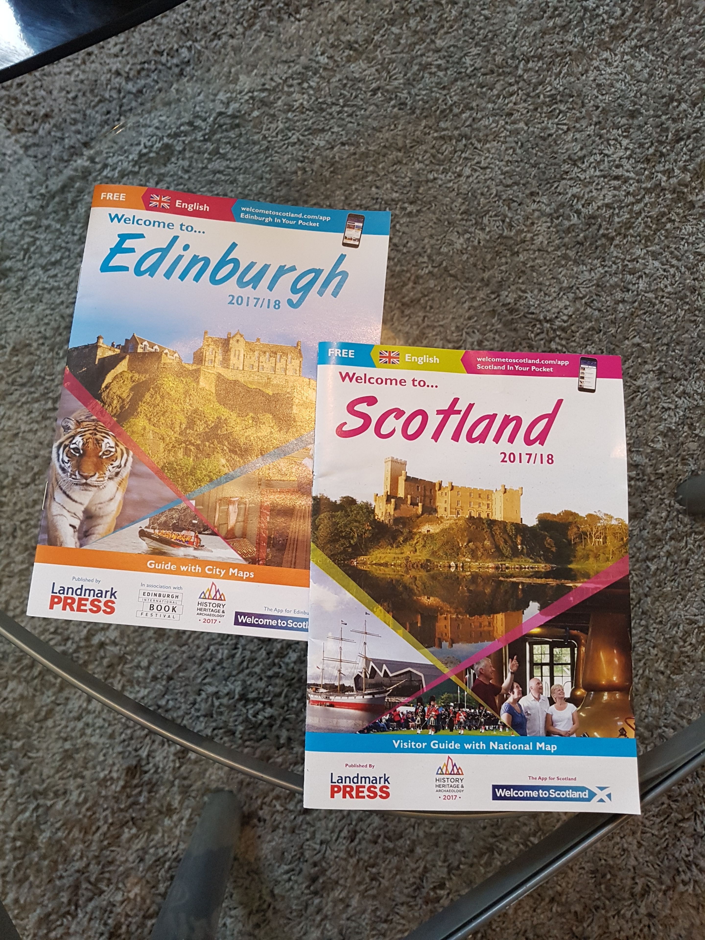 Two travel guides for Edinburgh and Scotland.