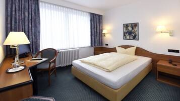 Einzelzimmer | Zimmersafe, Schreibtisch, kostenloses WLAN, Bettwäsche