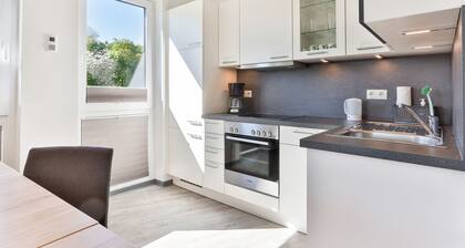 Apartamento moderno con impresionantes vistas del agua y el puente de Rügen