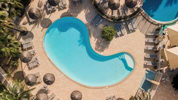 Outdoor pool, open 9 AM to 7:30 PM, pool umbrellas, pool loungers