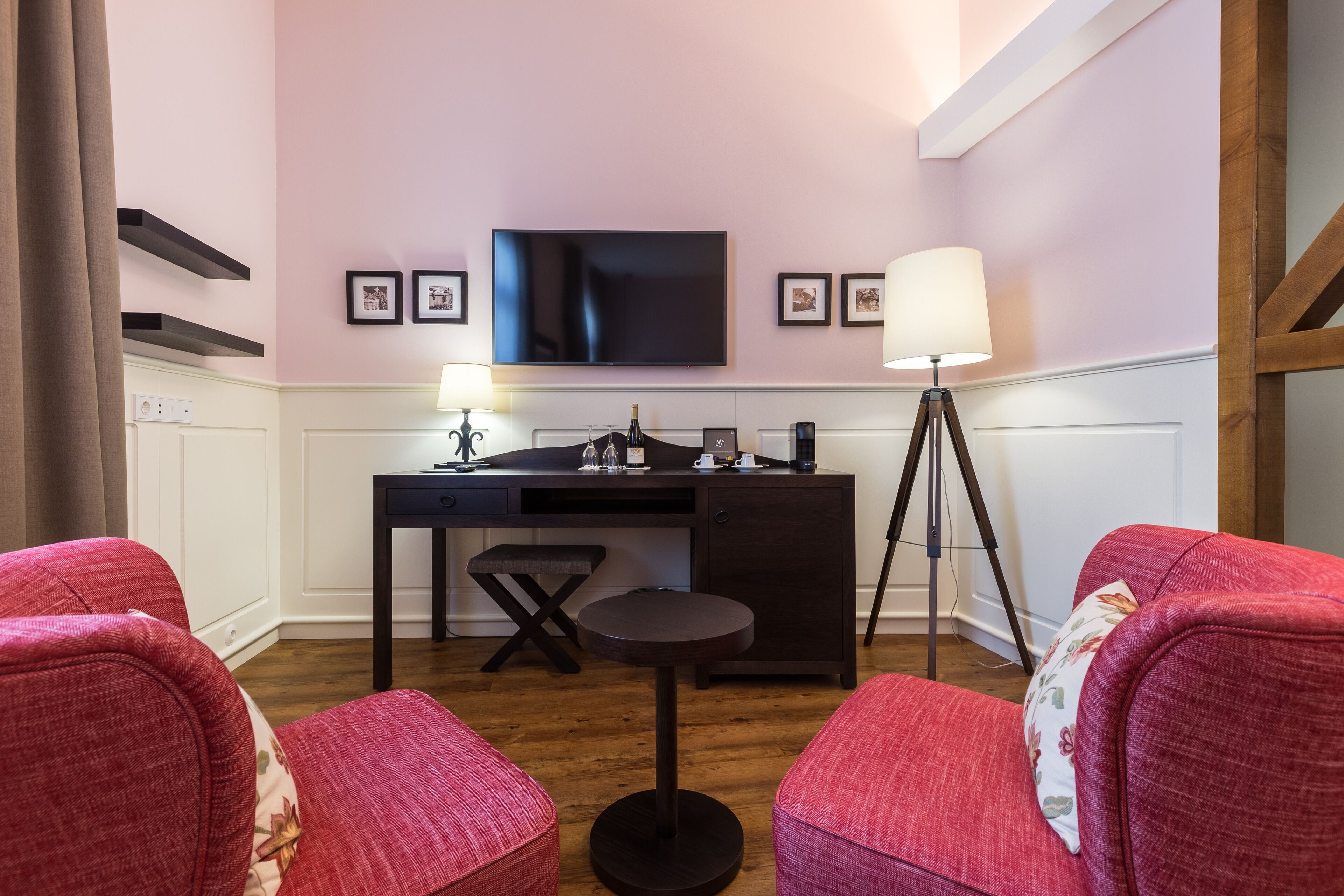 superior double or twin room | living area | flat-screen tv