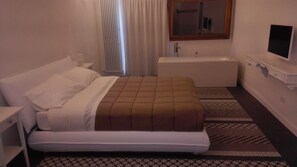 Premium bedding, minibar, in-room safe, desk