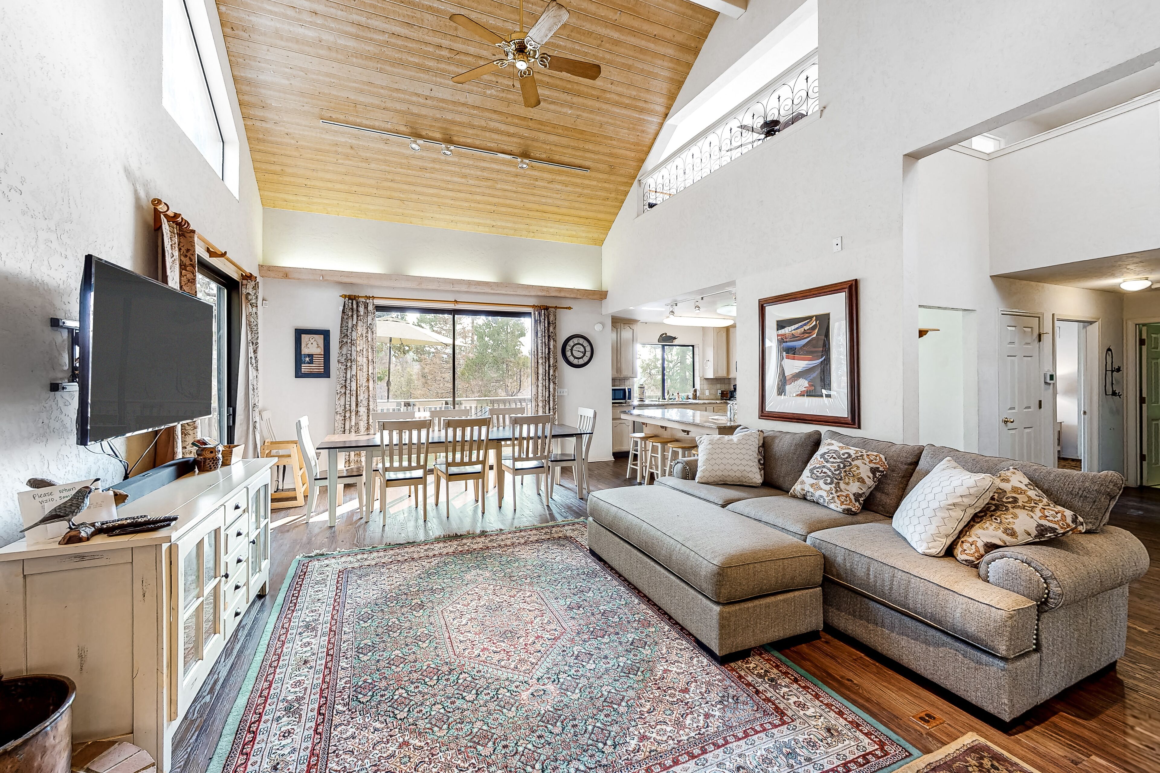Mountain-view home with large deck, easy lake access & wood stove