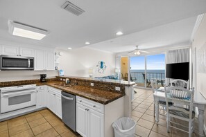 Fridge, microwave, oven, stovetop - Relax Above the Waves – 2BR Boardwalk Condo w/ Gulf Views, Pool & Tiki Bar (Panama City Beach)